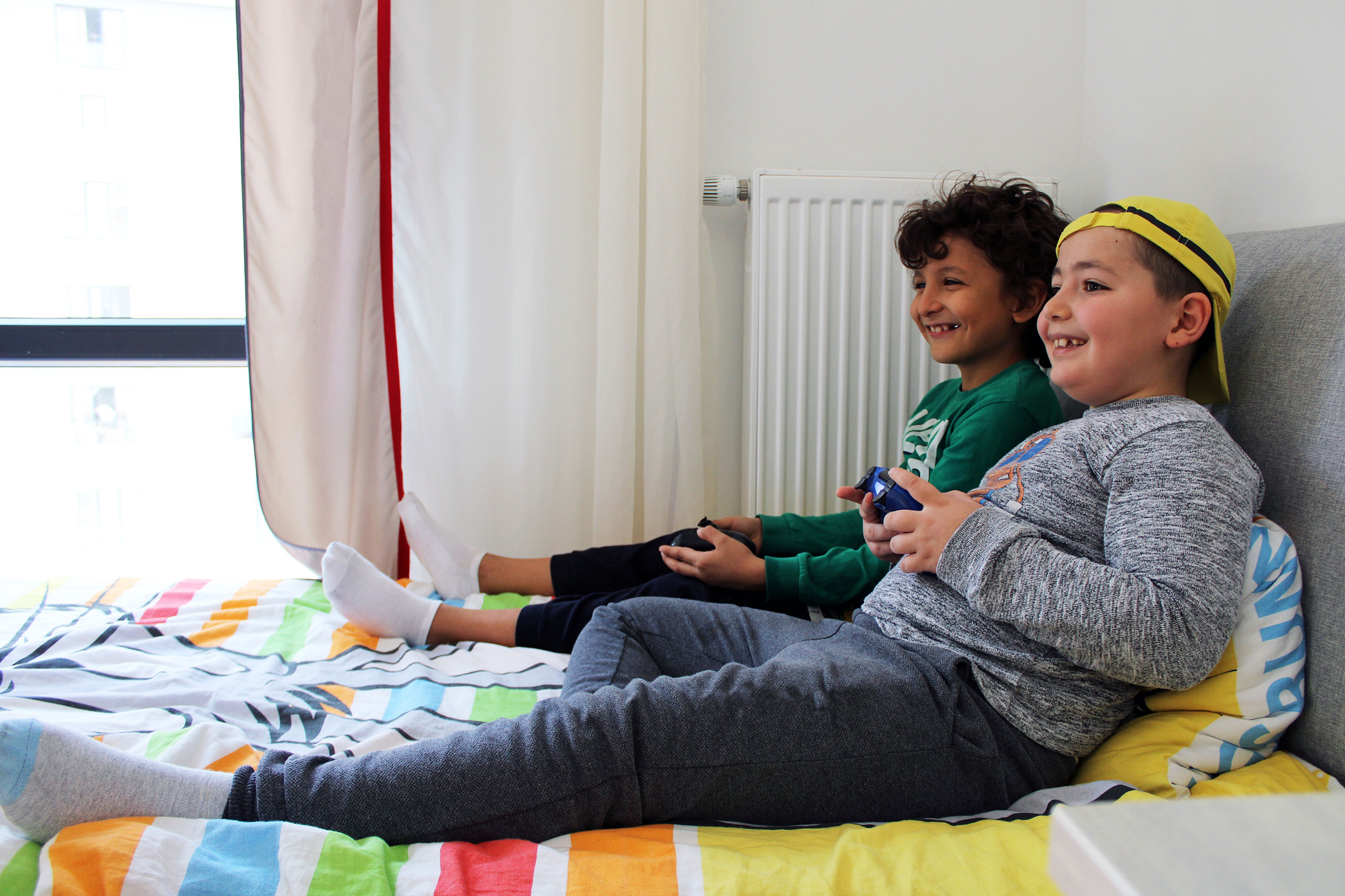 kids having fun playing games on pc